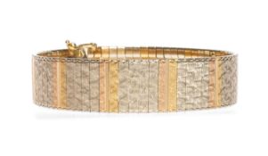 TRI-COLOUR METAL BRACELET, textured finish, 19.5cms long, stamped '750', 32.8g Provenance: