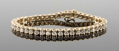 14CT YELLOW GOLD DIAMOND TENNIS BRACELET, set with forty-five 0.1ct diamonds, total diamond wt. 4.