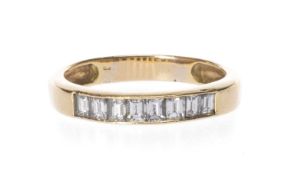 YELLOW METAL EIGHT-STONE DIAMOND RING, baguette cut, ring size U 1/2, 4.3g Provenance: private