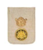 MOHAMMED REZA SHAH GOLD HALF PAHLAVI, AH1352 ۱۳۵۱ (1972) in white silk pouch with applied crown,