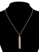 ELIZABETH II SILVER JUBILEE COMMEMORATIVE CYLINDER INGOT, London 1977, suspended from a silver