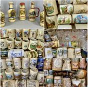 LARGE COLLECTION OF STONEWARE STEINS & BEER MUGS, including decorative souvenir examples,