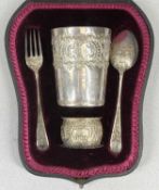 VICTORIAN SILVER CHRISTENING SET, beaker, fork, spoon, and napkin ring, each piece with ornate