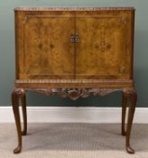 BURR WALNUT COCKTAIL CABINET with carved detail, fitted and mirrored interior, cabriole supports,
