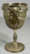 VICTORIAN SILVER GOBLET, high-relief repoussé decoration ram's heads, swags, and acanthus leaves,