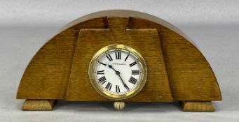 FINNIGANS DASHBOARD CLOCK with white enamel dial and black Arabic numerals, winding crown at 6 o'