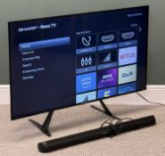 SHARP SMART TV, model 50FJ2K, and a sound bar, E/T Provenance: deceased estate Ynys Môn