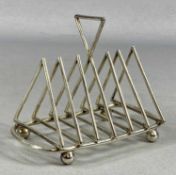 EDWARDIAN SILVER SIX-SECTION TOAST RACK, of triangular design, on ball feet, Mappin & Webb,