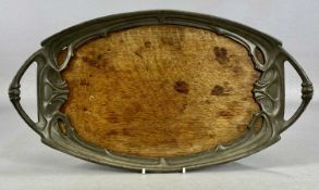 URAINIA ART NOUVEAU PEWTER & OAK OVAL TWO-HANDLED TEA TRAY, cast surround, pierced and with stylised