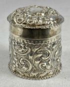VICTORIAN SILVER DRESSING TABLE BOX, cylindrical with dome lid, intricate repoussé scroll work,