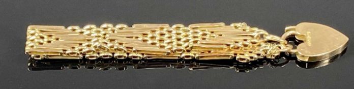 9CT GOLD GATE BRACELET with heart-shaped padlock and safety chain, 18g Provenance: private
