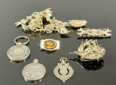 SILVER JEWELLERY / TRINKETS, including amber brooch, charm bracelet, floral brooch, filigree ship