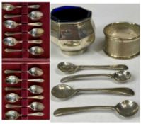 ASSORTED SILVERWARE, including two cased sets of six coffee spoons, octagonal open salt with blue