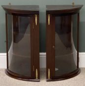 PAIR OF MODERN MAHOGANY WALL HANGING CORNER CUPBOARDS, with single glazed door and brass mounts,