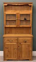 MODERN PINE COMPACT DRESSER, rack with twin-glazed doors, base with two drawers above two cupboard