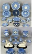 COLLECTION OF WEDGWOOD LIGHT BLUE JASPERWARE, including mantel clock, pair of posy vases, small