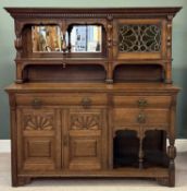 EDWARDIAN CARVED OAK SIDEBOARD, mirrored and glazed door top, over a base of three drawers, two