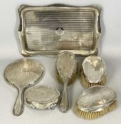 SILVER DRESSING TABLE SET, comprising tray, hand mirror, and hand brush, with machine engraved