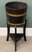 ANTIQUE OAK BRASS BANDED BARREL PLANTER, on tripod stand with lower shelf, 69 (h) x 32cms (diam.)