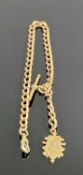 9CT ROSE GOLD ALBERT CHAIN with T-bar and medallion, gilt metal clip, 28g gross Provenance: deceased