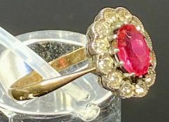 9CT GOLD DRESS RING, set with red and clear stones, size N, 2.0g Provenance: private collection