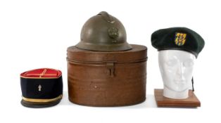 MILITARY CLUB HOUSE: INTERNATIONAL CAPS, to include French Army M1926 Adrian helmet, steel shell,