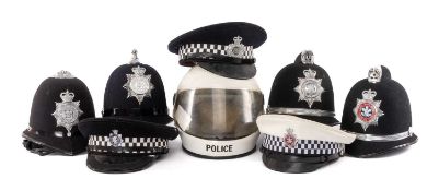 SERVICES CLUB HOUSE: GROUP OF POLICE HELMETS & HEADWEAR, to include a circa 1960s Devon & Cornwall
