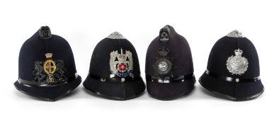 SERVICES CLUB HOUSE: FOUR POLICE HELMETS, to include a circa 1950s Glamorgan Police helmet, size
