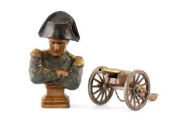 MILITARY CLUB HOUSE: BUST OF NAPOLEON & MODEL CANON, bust modelled in bicorne hat and coloured,