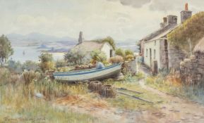 WARREN WILLIAMS (Welsh 1863-1941) watercolour - Anglesey coastal cottages, with lobster-man on his