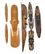 ASSORTED SOUVENIR CARVINGS, Papua New Guinea, all with cowrie shell inset eyes, two carved as food
