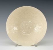 CHINESE DINGYAO MOULDED 'LOTUS BASKET' BOWL, Southern Song Dynasty, crisply decorated with seven