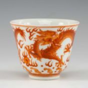 CHINESE IRON-RED 'DRAGON' WINE CUP, Guangxu six-character mark, decorated with two five-clawed