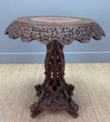 GOOD ANGLO-INDIAN CARVED TEAK OCCASIONAL TABLE, Bombay Presidency, c.1860, the circular tilt-
