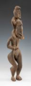 RAMU MATERNITY FIGURE, Papua New Guinea, the infant held on the shoulders of the adult, 50cms (h)