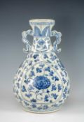 CHINESE BLUE & WHITE PORCELAIN VASE, painted in the Ming style with stylised scrolling lotus,