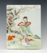 CHINESE 'SANNIANG JIAOZI' (三娘教子) FAMILLE ROSE PLAQUE, painted with mother and son playing in the