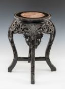 CHINESE MARBLE INSET HARDWOOD STAND, carved with bamboo ornament, 48 (h) x 28cms tabletop diam.