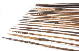 INTERESTING & VARIED GROUP OF BOWS & ARROWS, Papua New Guinea, including two bows, eighteen bamboo