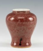 CHINESE MINIATURE PEACH BLOOM GLAZED BALUSTER VASE, Xuande four-character mark, 7.5cms (h)