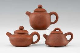 THREE CHINESE MINIATURE YIXING POTTERY TEAPOTS & COVERS, all with four-character potter's seal