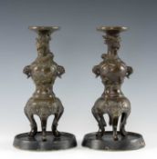 PAIR JAPANESE BRONZE ALTAR CANDLESTICKS, Meiji Period, decorated with dragons, crashing waves,