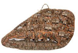 LARGE CARVED STORY BOARD, Papua New Guinea, decorated with figures paddling a large crocodile prowed