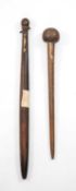 TWO OLD DINKA CLUBS, South Sudan, one with leather wrapped pommel handle, 71cms, the other with