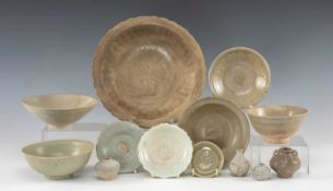STUDY GROUP OF THAI SAWANKHALOK CELADONS, 14/15th Century, including four jarlets and seven bowls