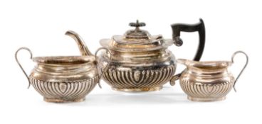 GEORGE V SILVER TEA SERVICE, Edward Viner, Sheffield 1926, engraved with armorial crest, half fluted