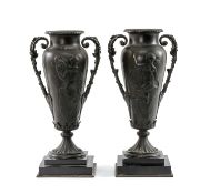 PAIR CONTINENTAL BRONZE URNS, slender ovoid form, acanthus handles, cast in shallow relief with
