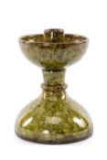 EWENNY POTTERY DATED CANDLESTICK, 17th C. style with hemispherical drip pan and domed foot,