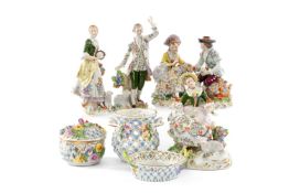 ASSORTED GERMAIN PORCELAIN including four Meissen-style figurines and three flower encrusted baskets