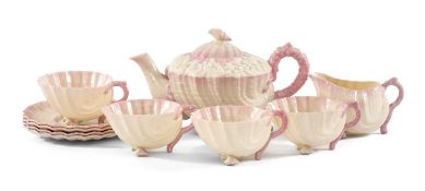 BELLEEK PORCELAIN 'PINK NEPTUNE' PART TEA SERVICE 2nd period (1891-1926), comprising, teapot, milk